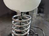 a lamp that is sitting on top of a table