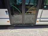 a bus that is parked on the side of the street