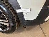a sticker on the side of a car with a sticker on it