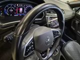 the steering wheel and dashboard of a car is shown in this image
