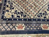 an image of a large oriental rug on a wooden floor