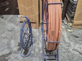 a picture of a cart with a hose on it