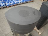 an image of a large gray trash can in a warehouse