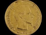an image of a gold coin with a woman ' s face on it
