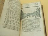 an open book with a picture of a castle on it