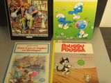 trois livres posés sur une table