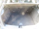 a trunk of a car with the back seat folded down