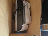 a box with a computer inside of it on the floor