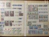an open book with a bunch of stamps on it