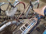 two bicycles that are parked next to each other in a garage
