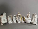 many figurines that are sitting on a table