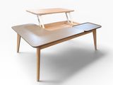 a wooden table with a laptop on top of it
