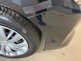 a close up of a car with a sticker on it