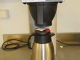 a coffee maker that is sitting on a counter