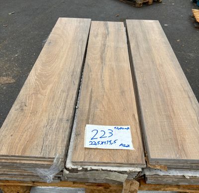 several pieces of wood stacked on top of each other in a warehouse