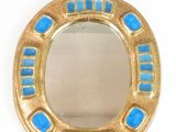 gold and blue glass mirror with a gold frame