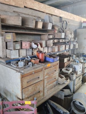 a garage with a lot of tools on the shelves