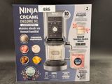 a box with a picture of a blender in it