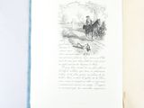 an open book with a drawing of a man riding a horse