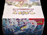 a box of pokemon cards sitting on a table