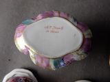 a plate with a quote on it sitting next to a pair of shoes