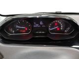 a close up of a car dashboard with a speedometer and gauges
