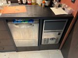 an image of a kitchen with a refrigerator and a dishwasher