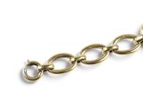 an image of a close up of a chain with a clock on it