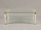 une table basse en laiton et en verre