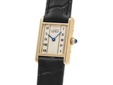 an 18k yellow gold ladies ' s wrist watch with black leather strap