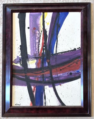 abstract painting on a wall with a brown frame and a white wall