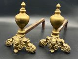 pair of antique brass candlesticks with lion heads on bases