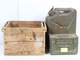 two old wooden boxes and a metal canister sitting next to each other