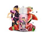 un gros plan sur une bouteille de liquide à côté d'un panier de fruits