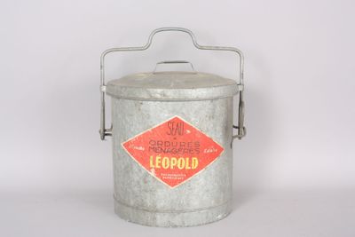 an old metal bucket with a lid and handle on a white background