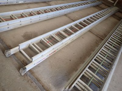 four ladders that are sitting on the floor