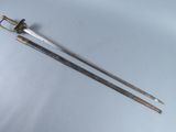 pair of two swords on a white surface with a white background