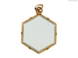 une image représentant une serrure hexagonale plaquée or