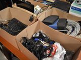 two boxes of electronic equipment sitting on a table