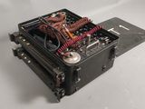 a close up of a small electronic device on a table
