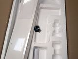 a box with a snowboard inside of it on a table