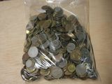 a bag full of coins sitting on a table