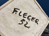 a sign that says freezer 365 on a rock