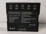 the back of a black box with information on it sitting on a table
