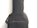 an image of a guitar case sitting against a white wall
