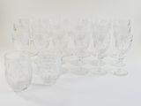 a lot of empty wine glasses sitting on a table