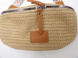 a purse with a brown leather handle on a white background