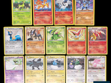 a lot of pokemon cards that are on the table