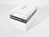 a white box with a black stripe on it on a white surface