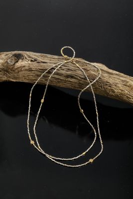 Collier long en or jaune 750 millièmes constitué de perles d…